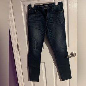 Express Mia mid rise legging, medium-dark wash size 6